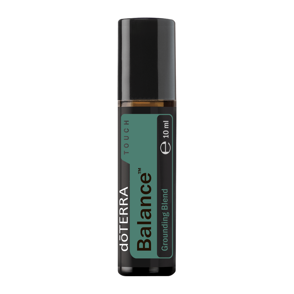 A 10 ml roll-on bottle of doTERRA Balance Grounding Blend essential oil, featuring a black cap and a dark green and black label, on a solid white background.