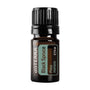 A 5ml amber glass bottle of doTERRA Black Spruce essential oil with a black ribbed cap and a green and white label, shown on a plain white background.