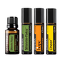 Four doTERRA essential oil products on a white background: a Shinrin-Yoku Forest Bathing Blend bottle, a Shinrin-Yoku Touch roll-on, a Hope Essential Oil Blend roll-on, and a Cheer uplifting blend roll-on.