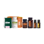 A collection of doTERRA wellness and supplement products arranged on a plain white background, including PB Assist, Terrazyme, MacaWr, and three essential oil bottles labeled Lemon, Melaleuca, and Rosemary.