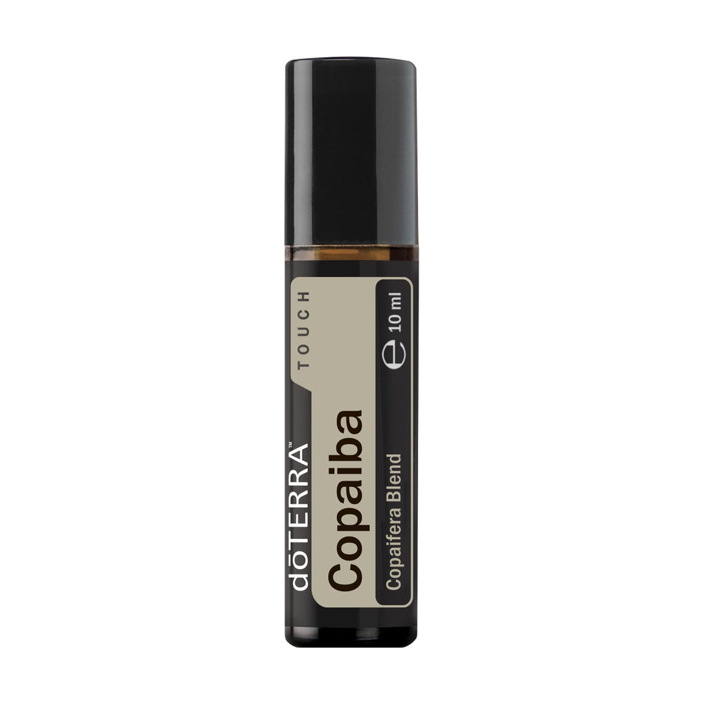 A 10 ml roll-on bottle of döTERRA Copaiba Touch essential oil blend, featuring a black cap and a beige and black label, on a solid white background.