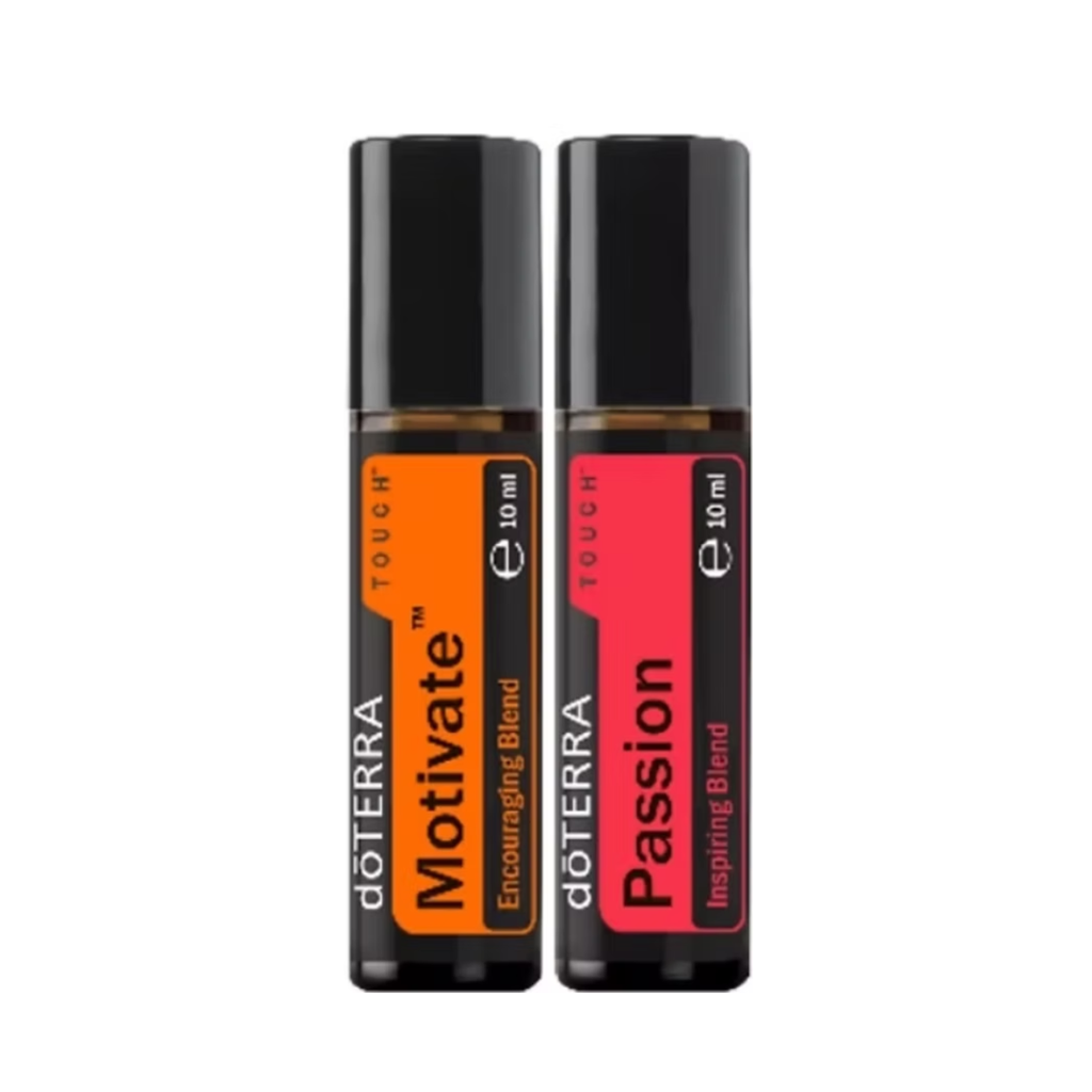 Two doTERRA Touch roller bottles, 'Motivate' with an orange label and 'Passion' with a red label, shown side-by-side on a white background.