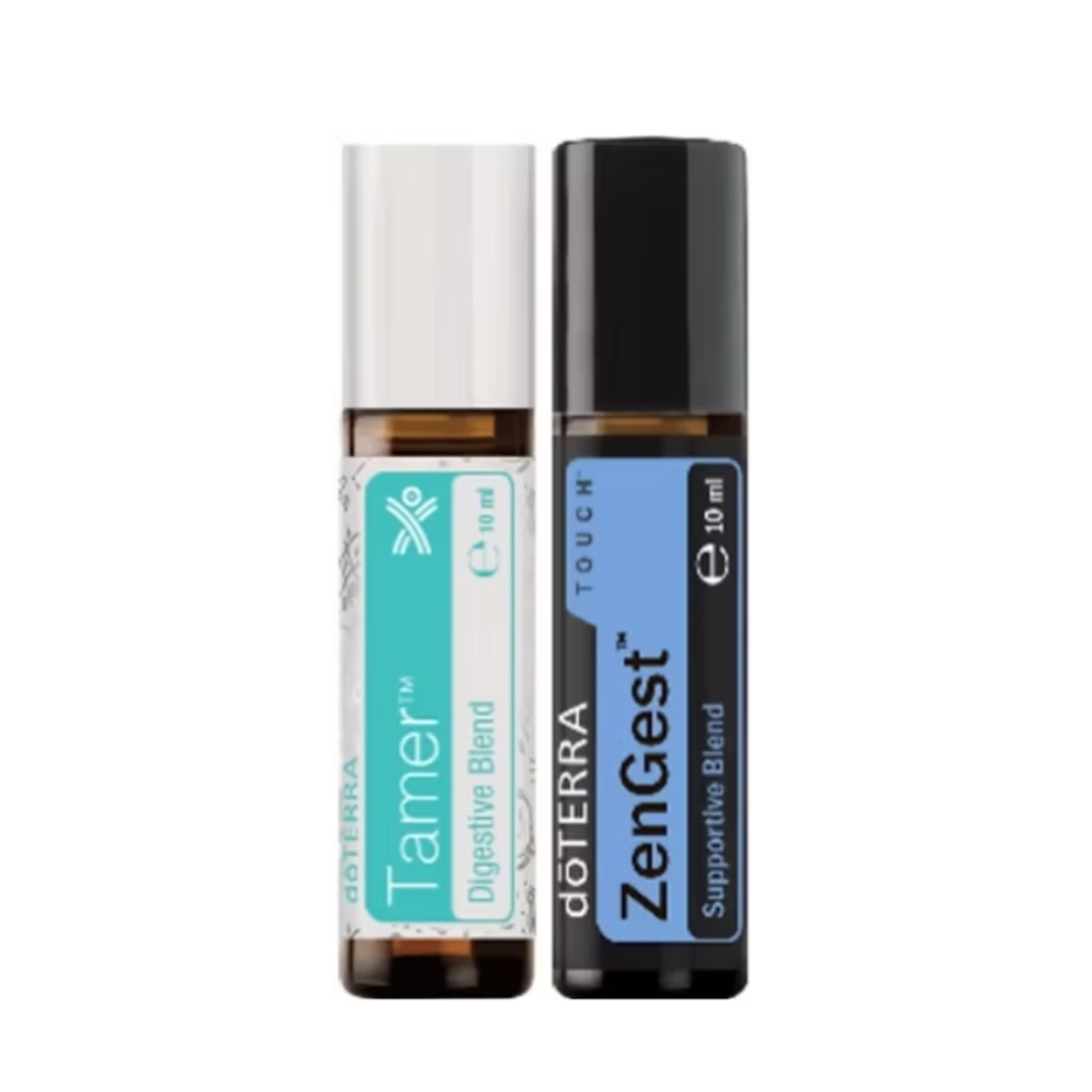 Two 10 ml roll-on bottles of doTERRA essential oils, Tamer Digestive Blend with a white cap and teal label, and ZenGest Supportive Blend with a black cap and blue label, shown side-by-side on a white background.