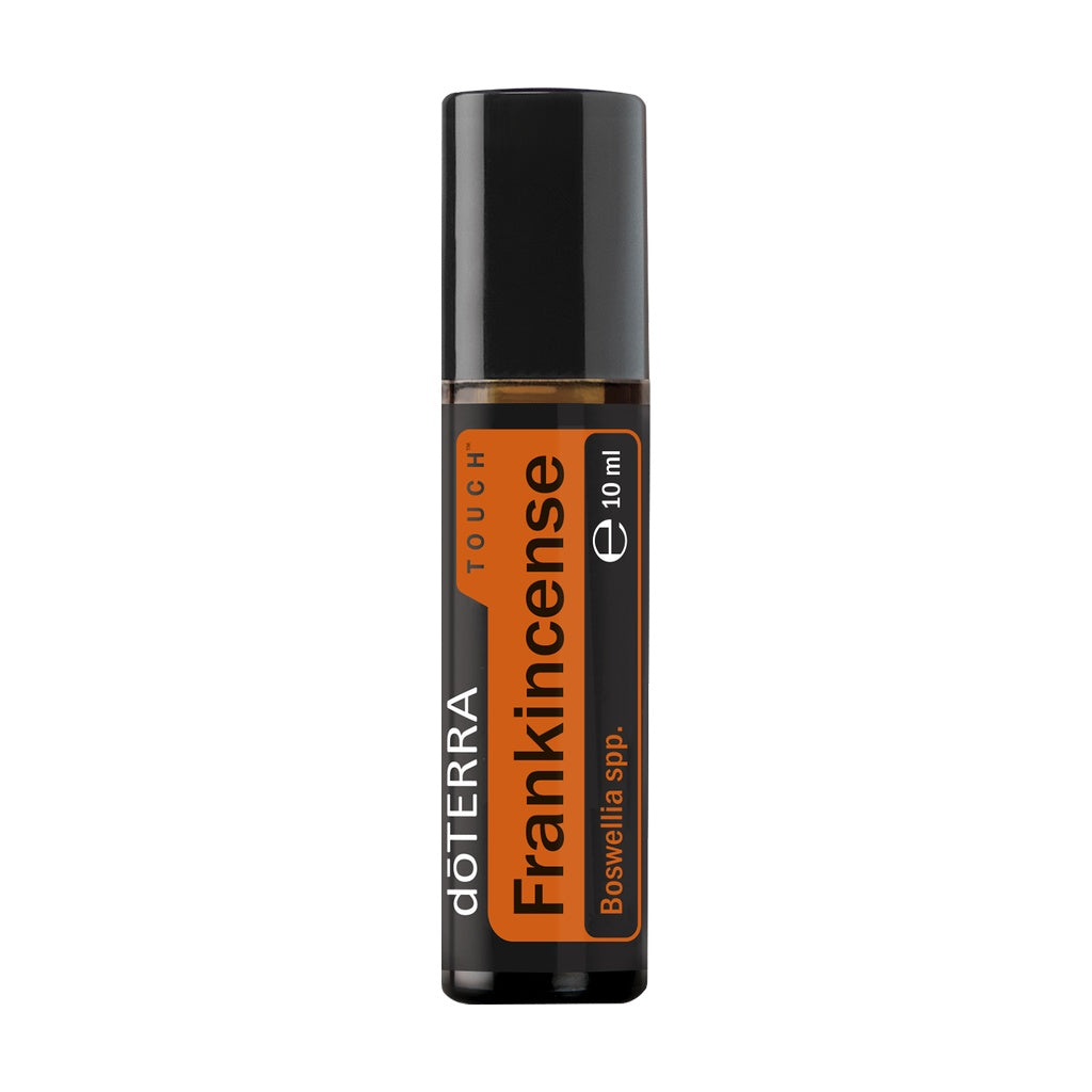 A 10 ml roll-on bottle of döTERRA Frankincense oil, featuring a black cap and a black and orange label, set against a plain white background.