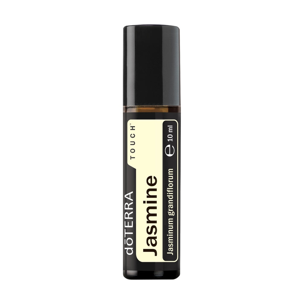 A 10 ml roll-on bottle of döTERRA Jasmine Touch essential oil, featuring a black cap and a cream-colored label with black text, set against a plain white background.