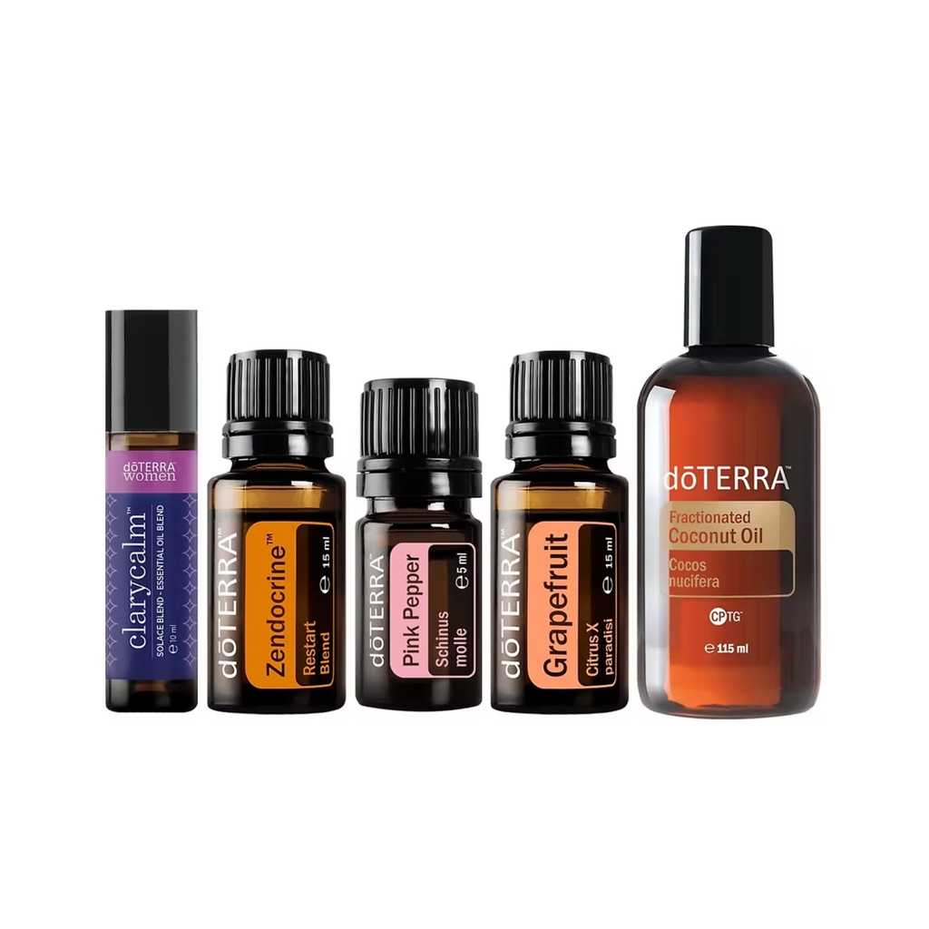 A 5-piece doTERRA essential oils and aromatherapy set on a white background, including a Clarymace roll-on, Zendrine, Pink Pepper, Grapefruit, and Fractionated Coconut Oil bottles.