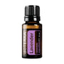 A 15 ml bottle of döTERRA Lavender essential oil on a solid white background. The bottle is made of dark amber glass with a black ribbed cap and features a purple and black label with the brand name 'döTERRA' and 'Lavender' printed on it.