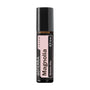 A 10 ml roll-on bottle of döTERRA Magnolia essential oil on a solid white background. The bottle is dark amber glass with a black cap and features a pink and black label with white text.
