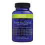 A bottle of doTERRA Women Bone Nutrient Essential Complex dietary supplement, featuring a dark blue bottle and cap with a lime green and dark blue label.