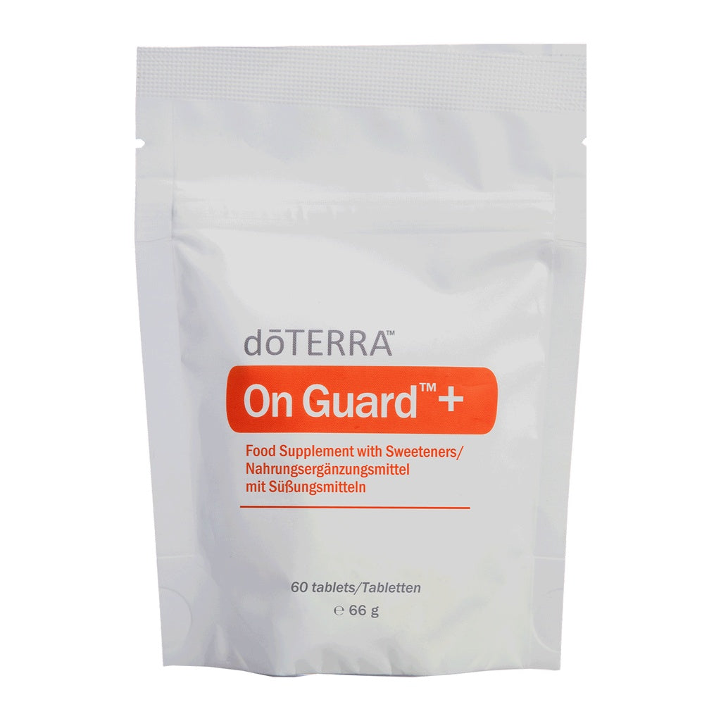 A white stand-up pouch of doTERRA On Guard + food supplement with sweeteners, featuring a prominent orange label and gray text, on a plain white background.