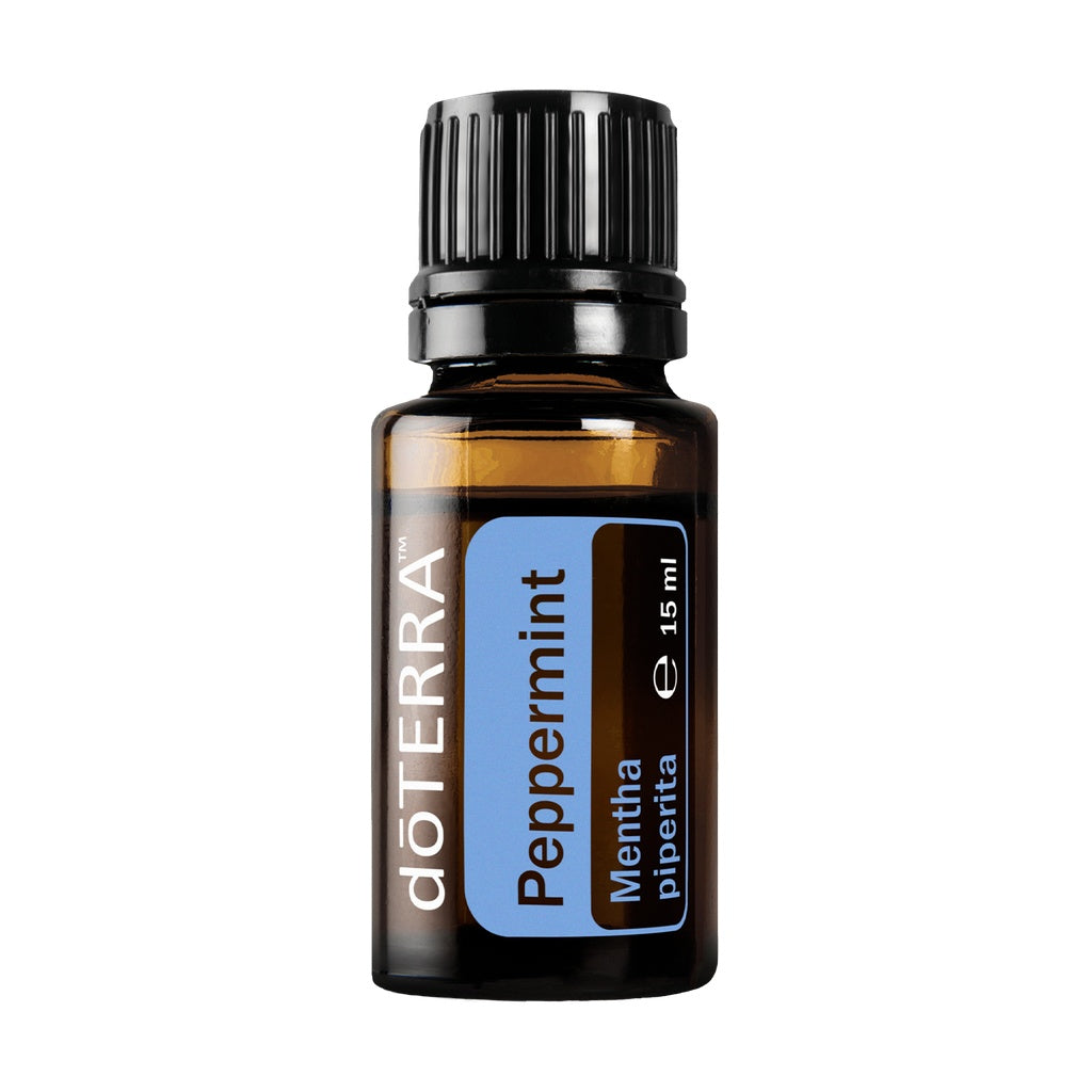 A 15 ml bottle of doTERRA Peppermint essential oil on a solid white background. The bottle is made of amber glass with a black ribbed cap and features a blue and brown label with white text.