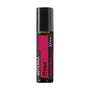 A 10 ml bottle of döTERRA Rose Touch rose damascena essential oil on a solid white background.