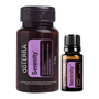 A doTERRA Serenity supplement bottle next to a doTERRA Resful Blend essential oil dropper bottle on a plain white background.