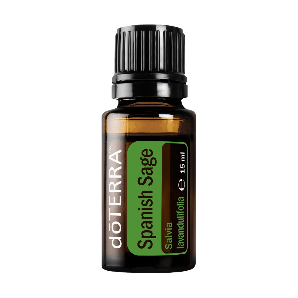 A 15 ml bottle of doTERRA Spanish Sage essential oil on a solid white background. The amber glass bottle has a black ribbed cap and a green and white label.