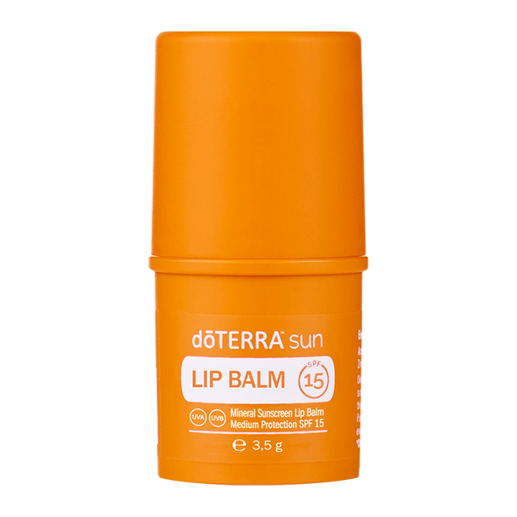 An orange doTERRA sun lip balm stick with SPF 15, shown on a clean white background.